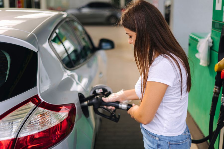 Man refuelling his rental car